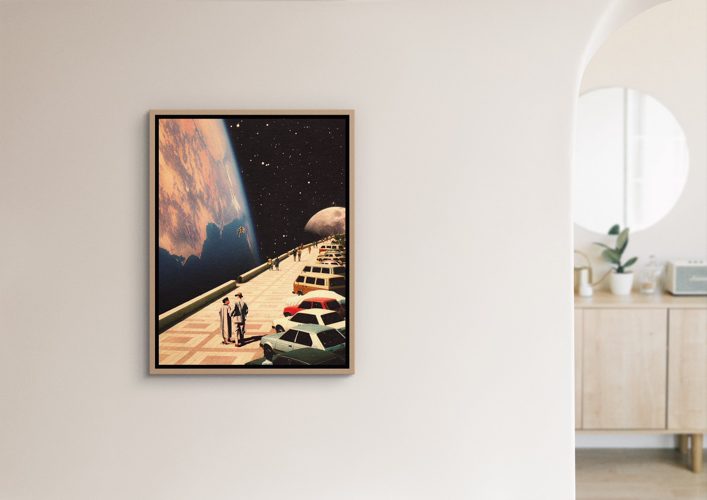 A big framed print of the Space Promenade artwork hanging on the wall next to another room.